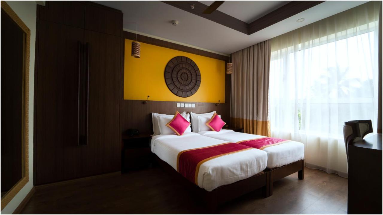 Vivin Luxury Suites Thiruvananthapuram Exteriör bild
